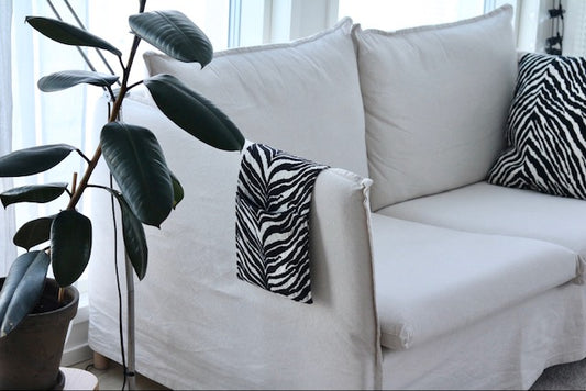 Säilytystasku sohvaan- kaukosäätimet aina käden ulottuvilla